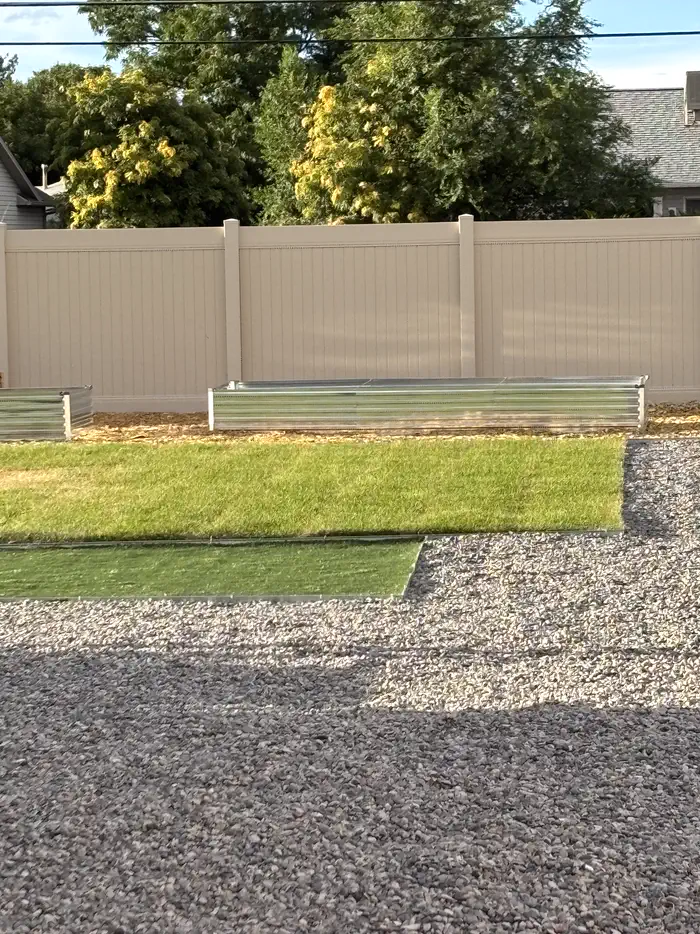 Raised beds against new fence