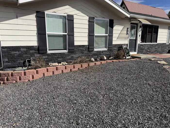 Low-water front yard in rock